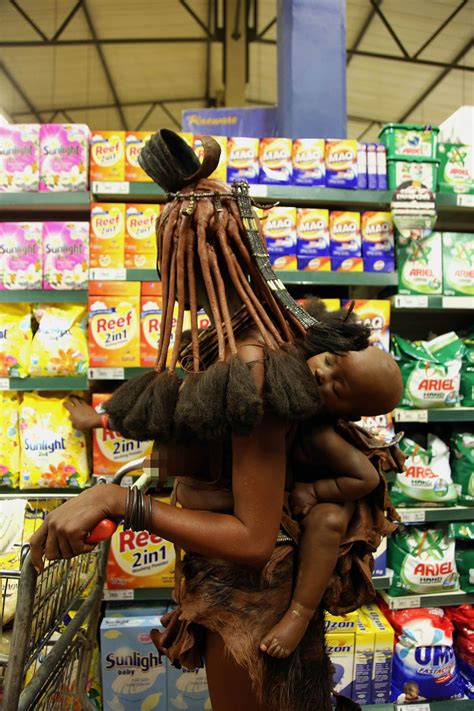 Striking Photographs Show African Tribeswoman Pick Up Some Supermarket