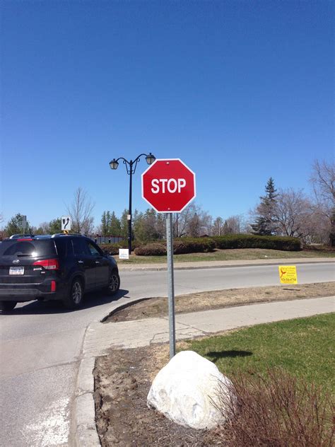 The Font On This Stop Sign Is Smaller Than Normal