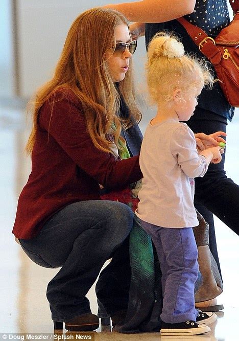 Amy Adams Goes From Front Row Fashionista To Jeans Clad Doting Mother