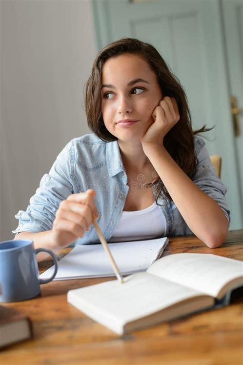 Bored Teenage Student Girl Studying At Home Stock Image Image Of