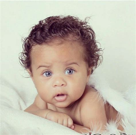 Cute Mixed Baby With Blue Eyes