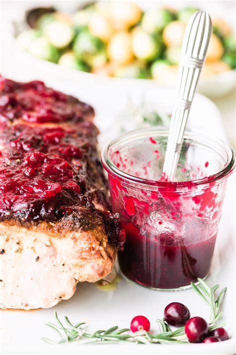 Add juice from the orange, the orange peel and chicken stock. My Cranberry Glazed Pork Roast is a succulent pork loin ...