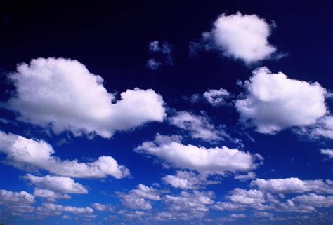 White Cumulus Clouds In Deep Blue Sky Photograph By Doug Armand Fine