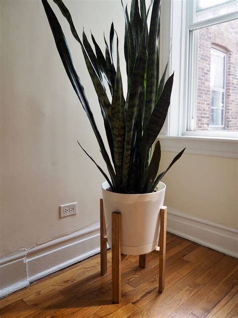 Indoor Planter, Wooden Plant Stand with Pot, Minimalist ... It solely depends upon the consumers taste as well as the type of plants.