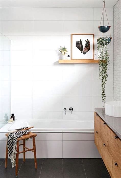 She was unable to drill shelves into the wall due to wiring, and. Bathroom simple tiles | Floating shelves, Floating shelves ...