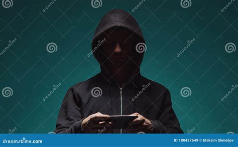 Portrait Of Computer Hacker In Hoodie Obscured Dark Face Data Thief