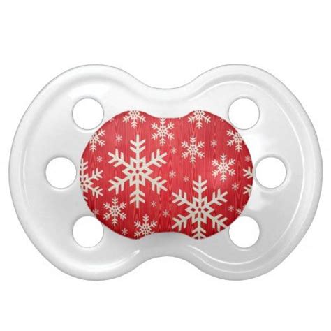 A Pacifier With Snowflakes On It