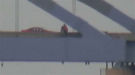 Watch Man Save Woman From Jumping Off Bridge