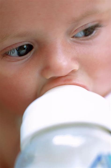 Bottle Feeding Baby Girl Photograph By Ian Hooton Science Photo Library