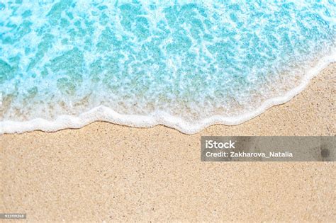 Summer Background With Soft Wave Of Blue Ocean On Sandy Beach Stock