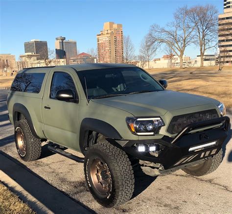camper shell 2012 Toyota Tacoma lifted for sale