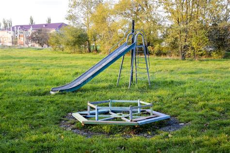 Children Playground Swings And A Slide To Slide Stock Image Image Of