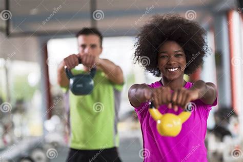Couple Workout With Weights At Crossfit Gym Stock Image Image Of Male