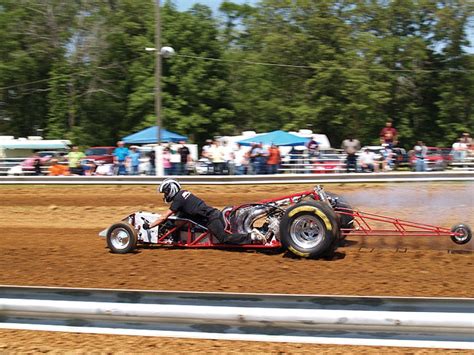These paddle like tires can move a ton of real estate. 3-CYLINDER TURBO 2-STROKE DRAG QUAD - Dirt Wheels Magazine