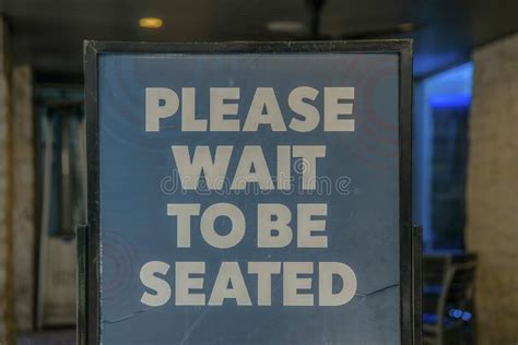 Please Wait To Be Seated Sign Board Outside A Restaurant In San Antonio