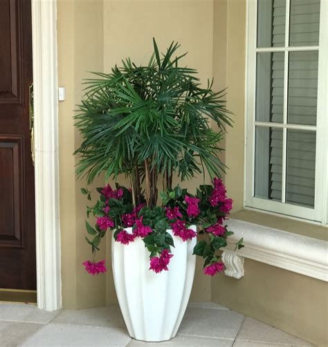 A Permanent Botanical Lady Finger Palm Underplanted With Outdoor Silk