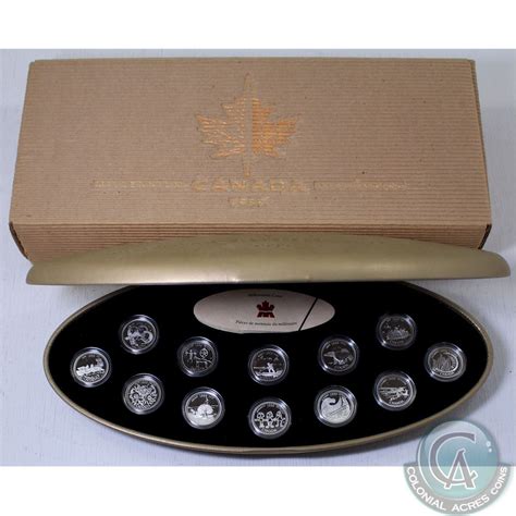 1999 Canada Millennium Proof 12-coin Sterling Silver 25-cent Set. Comes