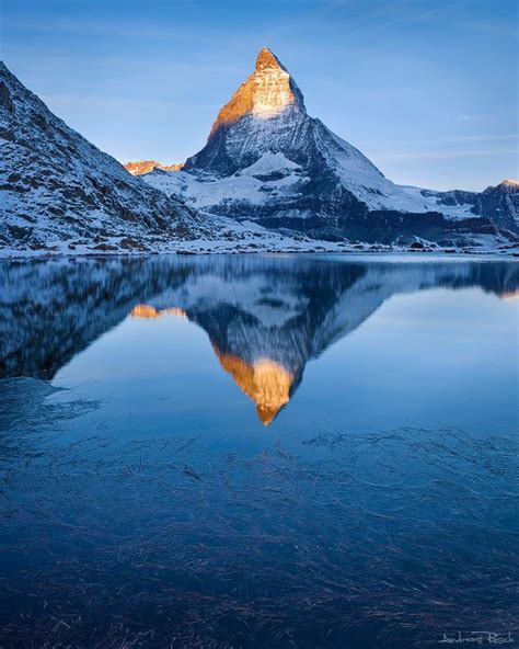 The Matterhorn Reflecting In The Slowly Freezing Riffelsee