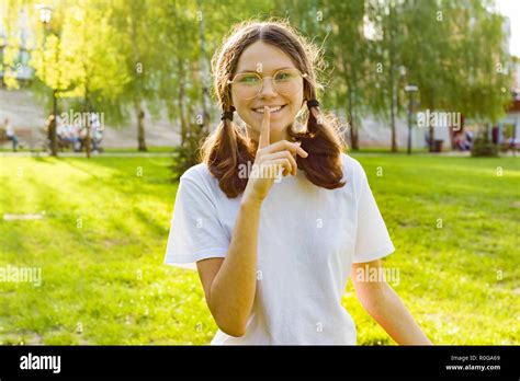 Outdoor Portrait Een Girl Shows Sign Quietly Secret Holds Finger Near