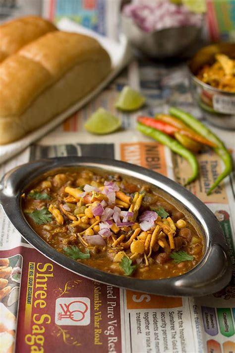 Chop the tomato, onion, ginger, green chillies.add chopped tomato, onion , garlic , ginger, coriander leaves, garam masala, turmeric powder, cumin and coriander powder , red. Misal Pav Recipe, How to make Mumbai Misal Pav Recipe ...