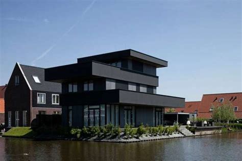 See more ideas about black house, black interior design, dark interiors. Lopsided Layered Lofts : Contemporary Black House by BBVH ...