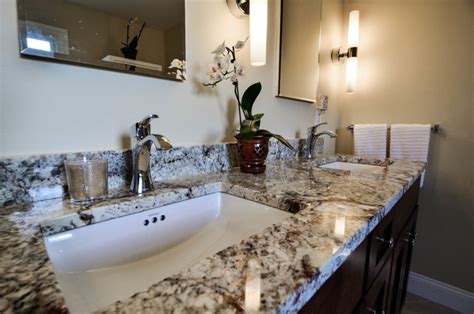 White torroncino granite looks absolutely incredible as a vanity top, as seen in the picture above. Black and white granite countertop with chrome fixtures ...