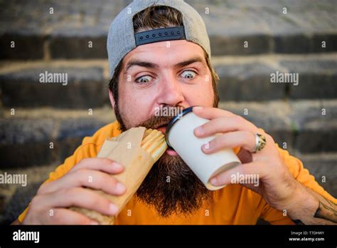 Street Food Concept Man Bearded Eat Tasty Sausage Urban Lifestyle Nutrition Junk Food