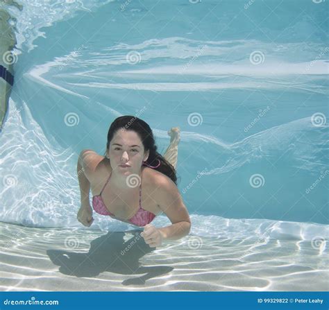 Woman Wearing A Bikini Swimsuit Holding Her Breathe Underwater Stock Photo Image Of Model