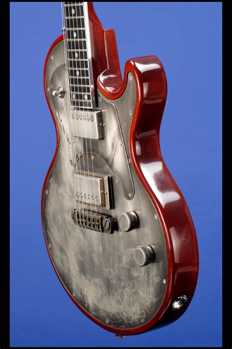 Guitars Fretted Americana Inc