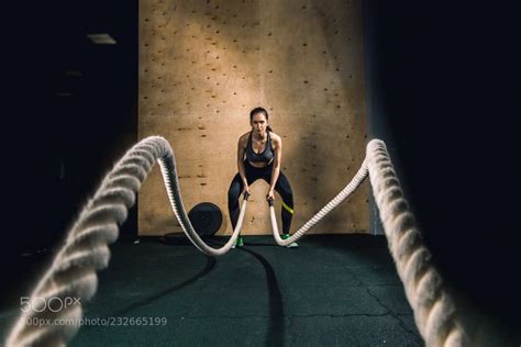 Battling Ropes Girl At Gym Workout Exercise Fitted Body By Pltnyaka