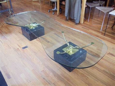 Whether you have remote controls and tv coasters on hand or provide a place to serve tea when you meet casually with close friends, coffee tables are essential in every aspect of. Italian Marble Brass and Glass Coffee Table For Sale at ...