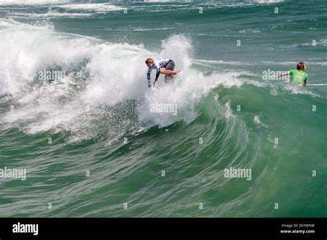 Huntington Beach, USA. 30 July, 2017. South African surfer Matthew