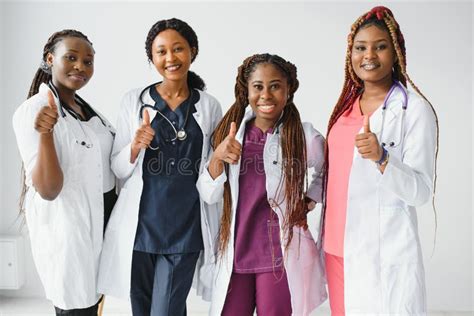 group of african doctor and nurse giving thumbs up stock image image of american african