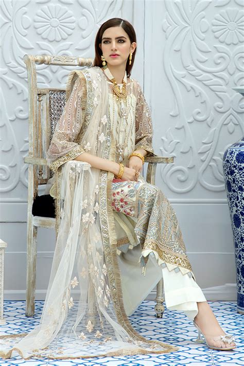 Buy Latest Pakistani Long Dress In Classy Gold Ivory Colour Nameera