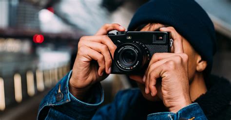 Person Taking Photo Using A Camera · Free Stock Photo