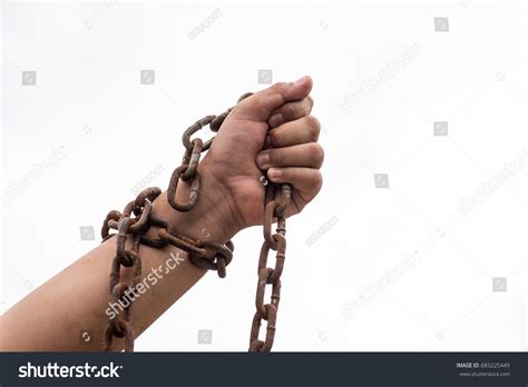 Rusty Chain Wrapped Around Mens Arms Stock Fotografie 683225449