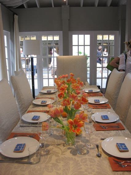 Send beautiful flower arrangements to brighten someone's day! table setting-my favorite color tulips | Table settings ...