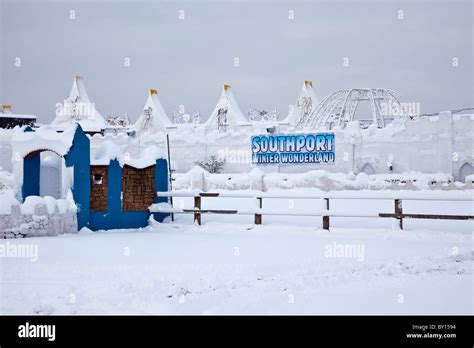 Landscape Of Southport Pleasureland Structures Covered In Snow Heavy