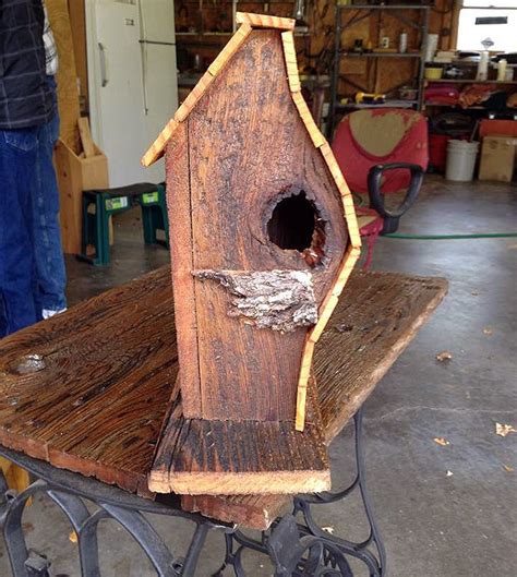 Learn how to create a homemade nesting box from a log (with video). reclaimed wood birdhouse | Unique bird houses, Bird house, Bird house kits