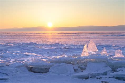Colorful Sunset Over The Crystal Ice Of Baikal Lake Stock Photo Image