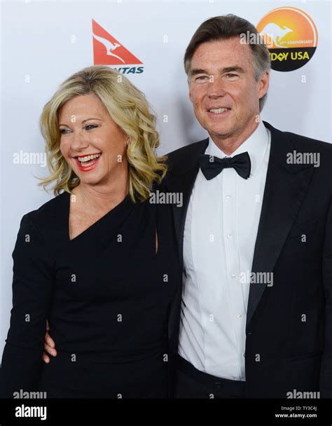 Actress Olivia Newton John And Her Husband John Easterling Attend The G