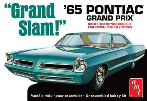 An Old Model Car Is On Display In A Plastic Box With The Words Grand Pontiac Grand Prix