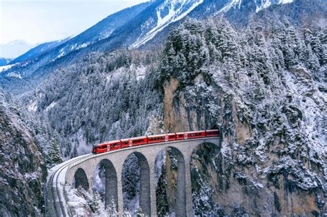 Aerial View Of Train Passing Through Famous Mountain In Filisur