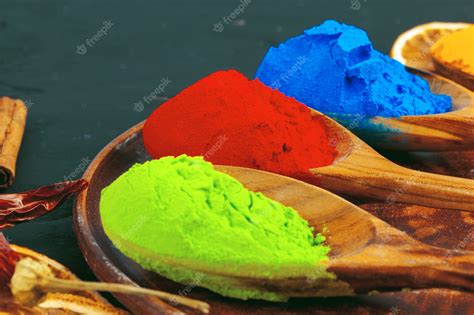 Premium Photo Traditional Indian Holi Colours Powder Spices On Dark