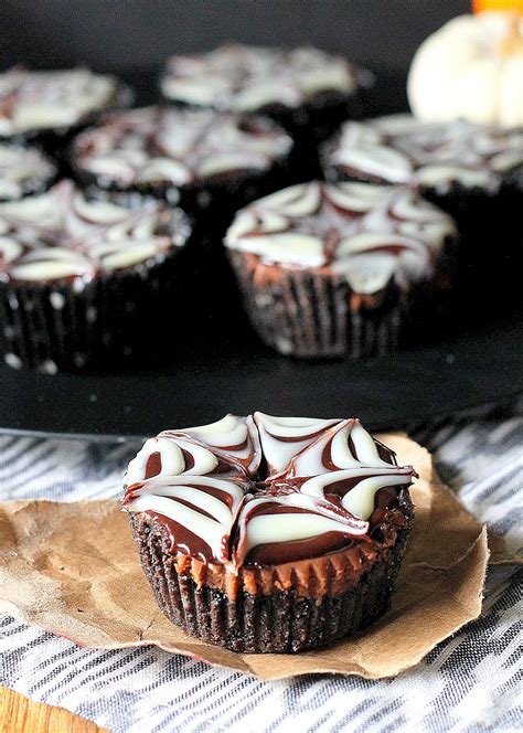 These easy chocolate marble mini cheesecakes are the perfect treat to make for a crowd! Death By Chocolate Mini Cheesecakes - Bakerita