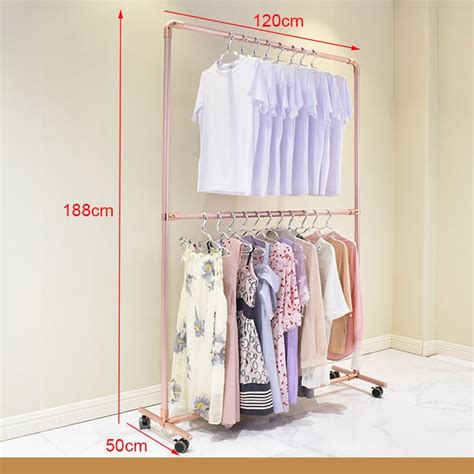 A Rack With Clothes Hanging On It And Measurements In Front Of The