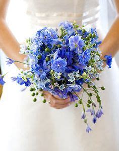 Check out this cobalt blue and orange wedding party and see more inspirational photos on theknot.com. Just blue flower ideas daisy and forget me not bouquet ...