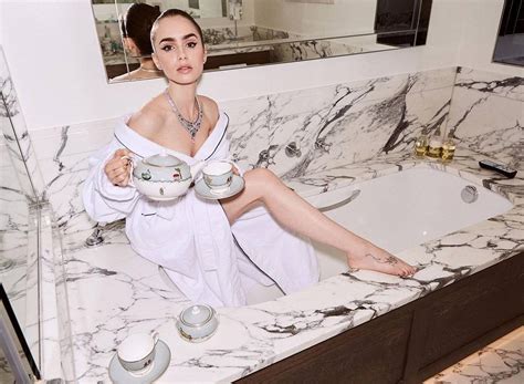 Lily Collins Slender Legs In Bath 2 Photos The Fappening