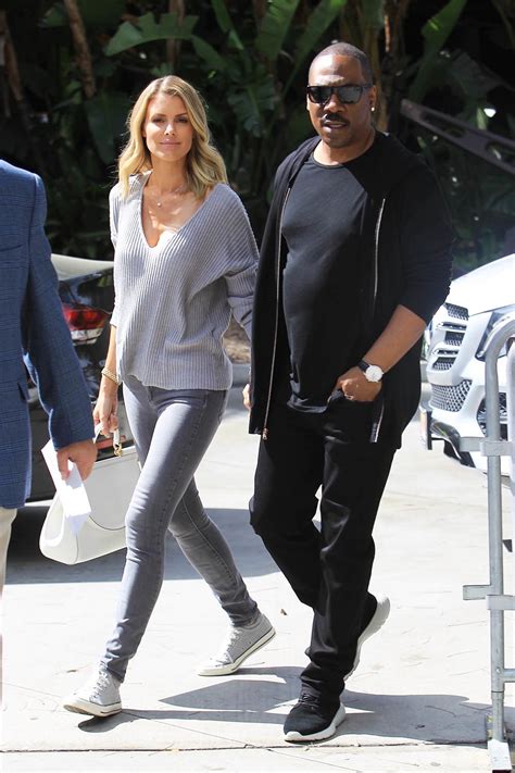 eddie murphy and paige butcher attend the lakers game in los angeles sandra rose