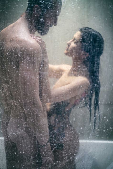 Naked Hipster Couple In Shower Stock Photo